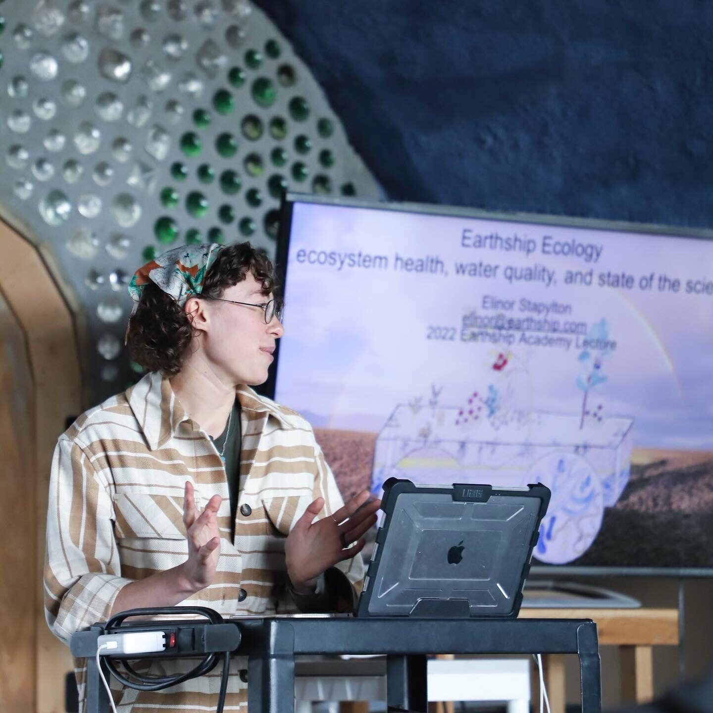 Elinor presenting Earthship Ecology lecture